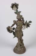 A Patinated Metal Figural Lamp