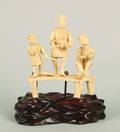A Japanese Ivory Figural Group