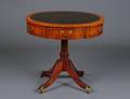 194 GEORGE III STYLE MAHOGANY DRUM TABLE