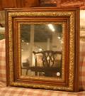 An Oak and Gilt Gesso Mirror