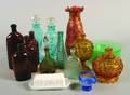A Group of Colored Glass Table Articles