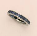 A Platinum and Blue Sapphire Eternity Ring