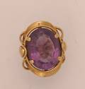 A Ladys Yellow Gold and Amethyst Ring