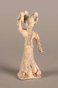 A Chinese Ceramic Figure of a Female Attendant