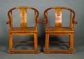 A Set of Four Chinese Hardwood Horseshoeback Chairs