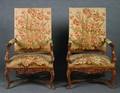 A Pair of Carved Walnut Open Armchairs