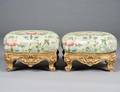 256 PAIR OF ROCOCO STYLE CARVED AND GILTWOOD FOOTSTOOL