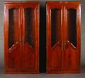 A Pair of Italian Walnut Curio Cabinets
