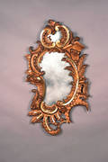 A Rococo Style Giltwood Mirror