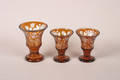 A Set of Ten Amber Cut to Clear Glass Chalices
