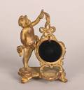 A Gilt Bronze Figural Pocket Watch Holder