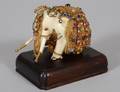 254 JEWELED MODEL OF AN IVORY ELEPHANT