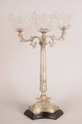 A Neoclassical Style Silvered Metal Three Light Candelabra