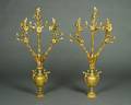 A Pair of Gilt Metal Four Light Candelabra