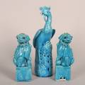 A Pair of Chinese Turquoise Glazed Foo Dogs