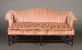 A Chippendale Style Camelback Sofa