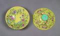 A Pair of Chinese Yellow Ground Famille Rose Bowls