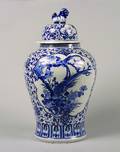 A Chinese Porcelain Blue and White Baluster form Vase and Cover