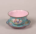 A Chinese Canton Enamel Cup and Saucer