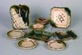 A Group of Japanese Stoneware Oribe Food Dishes and Plates