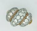 A Ladys 18 Karat Yellow Gold and White Diamond Ring