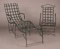 A Suite of Black Painted Garden Furniture