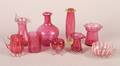 A Group of Pink Glass Table Articles