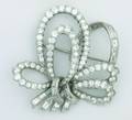 A Ladys Platinum and Diamond Brooch in a Bow Motif