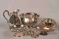 A Collection of Silver Plate Serving Articles