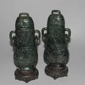 A Pair of Chinese Spinach Jade Jars and Covers
