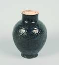 A Chinese Dark Green Glazed Archaistic Vase