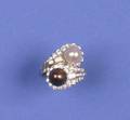 A 14 Karat White Gold Black and White Pearl and Diamond Ring