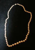 A Ladys Graduated Single Strand Cultured Pearl Necklace