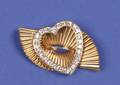 A Ladys 14 Karat Yellow and White Gold and Diamond Brooch