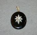 A Ladys Victorian Yellow Gold Silver Black Enamel and Diamond Mourning Brooch