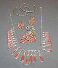 A Collection of Ladys Sterling Silver and Red Coral Jewelry