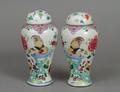 148 PAIR OF FAMILLE ROSE PORCELAIN VASES AND COVERS