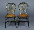 A Pair of Victorian Black Laquer and MotherofPearl Inlaid Side Chairs