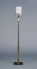 A Patinated and Gilt Metal Four Light Floor Lamp