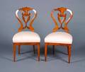 A Pair of Biedermeier Balloon Back Side Chairs