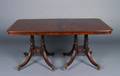 A George III Style Mahogany Inlaid Double Pedestal Dining Table