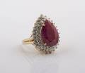 A 14 Karat Yellow Gold Ruby and Diamond Ring