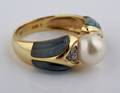 A 14 Karat Yellow Gold and Carved Blue Topaz Cultured Pearl and Diamond Ring