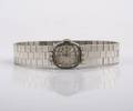 A Ladys 18 Karat White Gold Diamond Wristwatch Omega