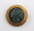 A Yellow Gold and Bloodstone Estruscan Revival Cameo Brooch