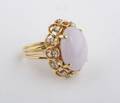 An 18 Karat Yellow Gold Lavender Jadeite and Diamond Ring