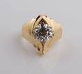 A 14 Karat Yellow Gold and Diamond Ring