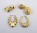 A Group of Four 14 Karat Yellow Gold Earrings