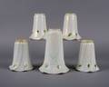 A Set of Four American Iridescent Glass Shades
