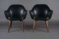 A Pair of Modern Black Naugahyde Upholstered Armchairs Knoll